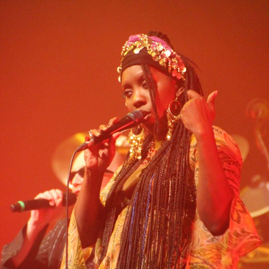Durga McBroom performing on stage.