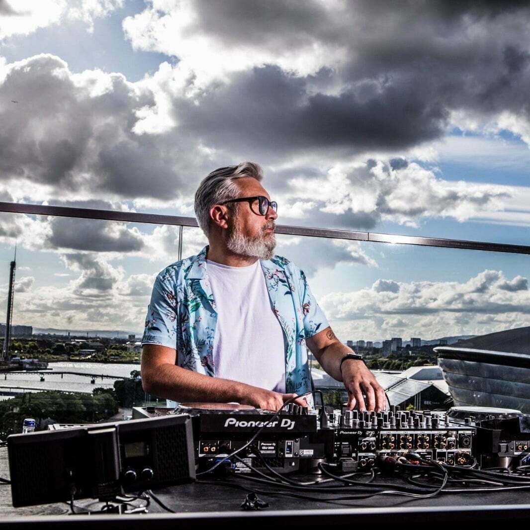 Michael Kilkie DJ'ing outside.